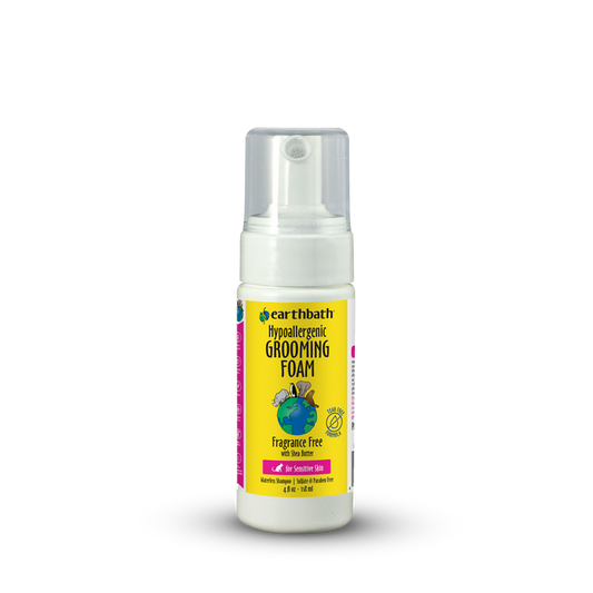 Earthbath grooming foam bottle with yellow label on a white background